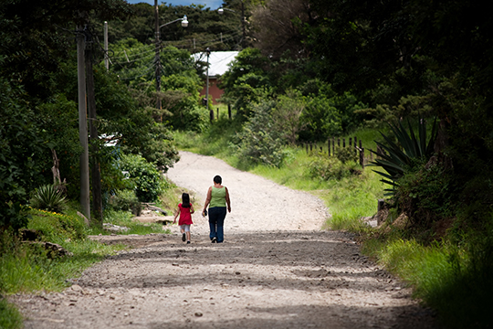 Woman and child walking in Costa Rica
